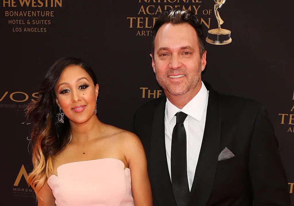 ‘No Wonder Tia Distanced Herself’: Tamera Mowry Hit with Strays After Right Wing Husband Adam Housley’s ‘Privileged’ Rant About Food Stamps