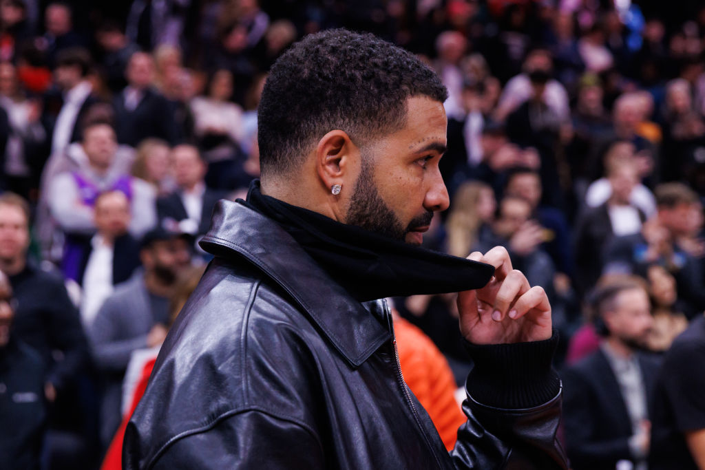 Still Bothered: Drake Rocks Bullet Hole-Filled Hoodie, Takes Another Jab At LeBron James During Opening Show On Australian Tour